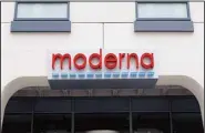  ?? ?? A sign marks an entrance to a Moderna building in Cambridge, Mass, May 18, 2020. Moderna reports quarterly financial results on Nov 3. (AP)