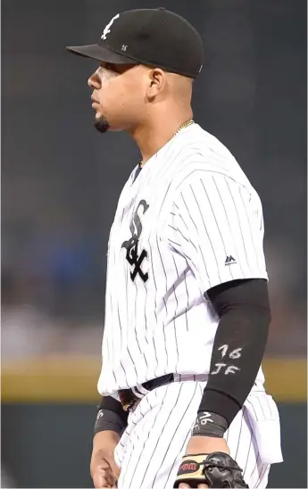  ??  ?? Sox first baseman Jose Abreu honors late Marlins ace Jose Fernandez on his sleeve Monday.