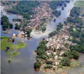  ?? — PTI ?? An aerial view of a flood-affected village in Bihar.