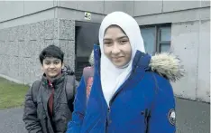  ?? STAN BEHAL/POSTMEDIA NETWORK ?? Khawlah Noman and her brother Mohammad Zakarijja leave school after they appeared before the media with their mom Saima Samad, to talk about the assault that happened to Khawlah on their way to Pauline Johnson Public School in Toronto this morning. A...