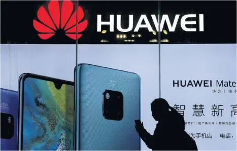  ?? ANDY WONG AP ?? China’s government has accused Washington of trying to block its industrial developmen­t after U.S. Vice President Mike Pence said Chinese tech giant Huawei and other telecom equipment suppliers are a security threat. •