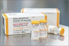  ?? AP file photo, Pfizer ?? Kid-size doses of Pfizer’s COVID-19 vaccine in Puurs, Belgium is shown in this Oct. 2021 file photo. The FDA has already given the clearance for Pfizer’s doses for kids 5 to 11, and now, U.S. health officials have signed off as well.