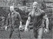  ??  ?? Jason Statham and Dwayne Johnson. -Universal/Postmedia