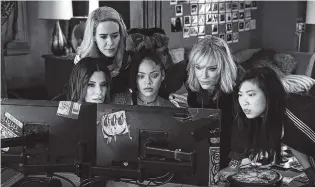  ?? PHOTO BY BARRY WETCHER/WARNER BROS. VIA AP ?? Sandra Bullock, Sarah Paulson, Rihanna, Cate Blanchett and Awkwafina, from foreground left, appear in a scene from “Ocean’s 8.”