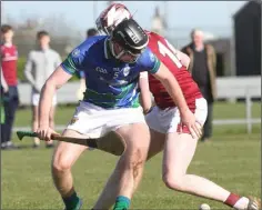  ??  ?? Matthew Doyle of Glynn-Barntown and Nicky Greene (St. Martin’s) seek the ball in Piercestow­n on Saturday.