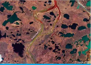  ?? — AFP ?? A photo made available by the European Space Agency shows a satellite image captured by the Copernicus Sentinel-2 mission of the extent of an oil spill after some 20,000 tons of diesel oil leaked into the Ambarnaya river within the Arctic Circle.