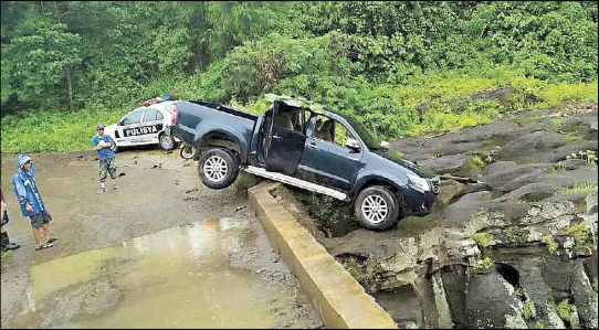  ??  ?? Photo provided by the Calabarzon police shows a Toyota Hi-Lux pickup believed to be the getaway vehicle of the killers of vice mayor Alexander Lubigan of Trece Martires City, Cavite. The vehicle was found abandoned on the Mabacao-Pantihan bridge in Barangay Tulay B in Maragondon, Cavite yesterday.