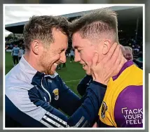  ?? ?? WE DID IT: Wexford’s Charlie McGuckin (right) celebrates