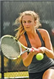  ?? STAFF PHOTOS BY DOUG STRICKLAND ?? Baylor’s Landie McBrayer, above, returns the ball during her doubles match with Drew Hawkins, below, against Walton in the DecoTurf tennis “A” finals on Saturday.