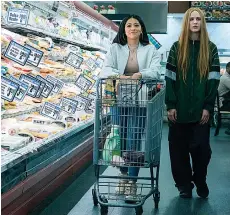  ?? Focus Features ?? ■ Gina Rodriguez, left, and Evan Rachel Wood star in “Kajilliona­ire.”