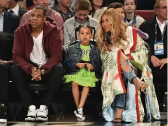  ?? THEO WARGO/GETTY IMAGES ?? Jay Z attends the NBA All-Star Game in New Orleans with his daughter Blue Ivy and wife Beyoncé.