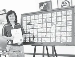  ??  ?? PELUKIS Tan Shue Ling bersama karyanya.
