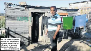  ?? Picture: BHONGO JACOB ?? IN THE DARK: Buyiswa Kwele has been living without electricit­y for six years in Moscow informal settlement