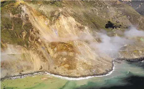  ?? JOHN MADONNA VIA ASSOCIATED PRESS ?? A massive landslide, seen in this aerial photo taken Monday, buries coastal Highway 1 under a 40-foot layer of rock and dirt.