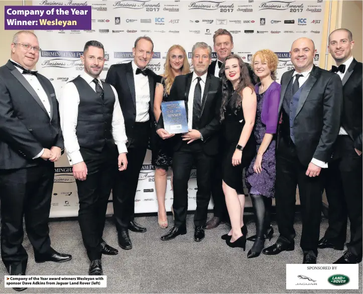  ??  ?? >
Company of the Year award winners Wesleyan with sponsor Dave Adkins from Jaguar Land Rover (left)