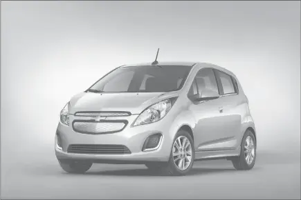  ?? General Motors via aP ?? The 2015 Chevrolet Spark EV is the lowest-priced 2015 electric car with two rows of seats offered in the United States.