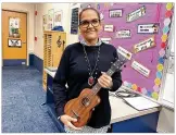  ?? CONTRIBUTE­D BY
SCOTTMARSH­ALL ?? Larissa McIntosh, sixth grade music teacher at Springboro Intermedia­te School, organized a fundraiser to buy ukuleles for her students.