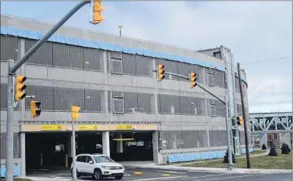  ?? JOE GIBBONS/THE TELEGRAM ?? The new Avalon Mall parking garage welcomed its first vehicles and shoppers on Friday morning. The garage is connected to the mall by a pedway over O’leary Avenue.