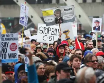  ?? VINCE TALOTTA/TORONTO STAR FILE PHOTO ?? Protesters gathered at Toronto’s Nathan Phillips Square on March 14 to rally against the federal government’s anti-terrorism bill, C-51, which a new UN report has warned lacks safeguards to protect civil liberties.