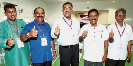  ??  ?? Five-man show: The candidates for Sentosa – (from left to right) Rajan from PAS, Maniam of Barisan, Gunarajah from PKR, Telaiambla­m of PRM and Independen­t candidate Sundarajoo – are contesting in a five-cornered fight for the state seat.
