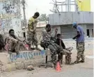  ?? Picture: EL TAYEB SIDDIG/REUTERS ?? ON ALERT: Members of the Sudanese Armed Forces on the street, a year into the war with the paramilita­ry Rapid Support Forces, in Omdurman, Sudan