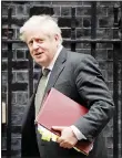  ??  ?? British Prime Minister Boris Johnson leaves 10 Downing Street in London, to attend the weekly Prime Minister’s Questions at the Houses of Parlia
ment, in London, Sept 23. (AP)