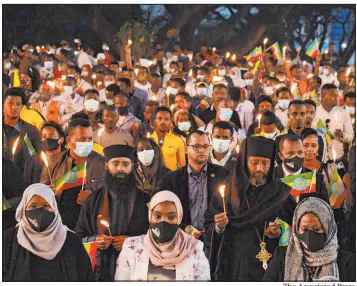  ?? The Associated Press ?? A crowd in Addis Ababa, Ethiopia, on Wednesday mourns soldiers killed by forces loyal to the Tigray People’s Liberation Front.