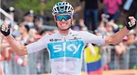  ??  ?? Britain’s Chris Froome celebrates as he crosses the finish line to win the 19th stage of the Giro d’Italia cycling race, from Venaria Reale to Bardonecch­ia, in Bardonecch­ia, Italy, yesterday.