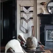 ?? COURTESY OF SCOTT GABRIEL MORRIS ?? A woven wall hanging adds an element of texture to this living space.