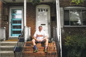  ?? Toni L. Sandys / The Washington Post ?? Gary Politzer, a lifelong Orioles fan who is missing going to games and watching his team on television, poses for a photograph outside his home.