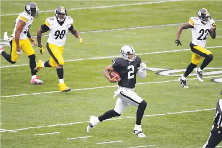  ?? Marcio Jose Sanchez / Associated Press 2013 ?? When Washington wide receiver Terrelle Pryor played for the Raiders, he set the record for the longest touchdown run by a QB.