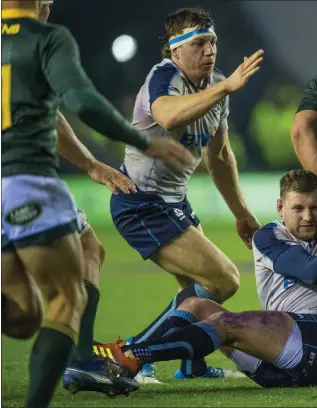  ??  ?? Finn Russell (ground) and Hamish Watson in action against Scotland last time out against South Africa in 2018