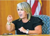  ?? LUIS SANCHEZ SATURNO/THE NEW MEXICAN ?? Gov. Michelle Lujan Grisham goes over the state’s latest coronaviru­s statistics during a news conference Thursday to address New Mexico’s response to the pandemic.