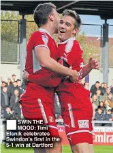  ??  ?? SWIN THE MOOD: Timi Elsnik celebrates Swindon’s first in the 5-1 win at Dartford