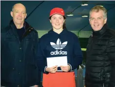  ??  ?? Julianna Carton receives first prize, with Shankill Tennis Club chairman Derek Adams and Garbhan O Nuallan from Leinster Tennis.