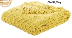  ??  ?? Catherine Lansfield chevron knit throw, £24.99, Very.