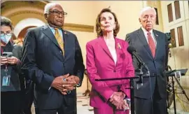  ?? ?? CLYBURN, left, House Speaker Nancy Pelosi and House Majority Leader Steny H. Hoyer, all octogenari­an legislator­s, appear at a news conference in November.