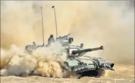  ?? AFP ?? An Indian Arjun Mark II tank drives through sand during a display at the DefExpo 2018, a large defence exhibition showcasing military equipment, on the outskirts of Chennai on Wednesday.