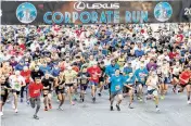  ?? SAM NAVARRO Special for the Miami Herald ?? More than 14,000 runners participat­ed in the 2023 Corporate Run. About 18,000 are expected on Thursday.