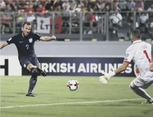  ??  ?? Harry Kane scores England’s opening goal in their 4-0 World Cup qualifying victory over Malta last night.