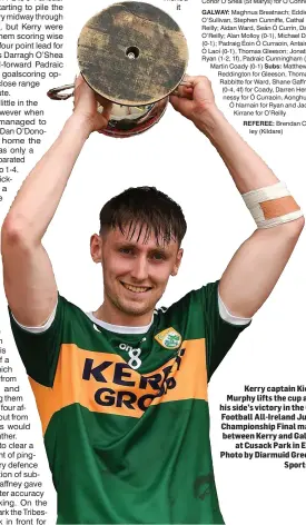  ??  ?? Kerry captain Kieran Murphy lifts the cup after his side’s victory in the GAA Football All-Ireland Junior Championsh­ip Final match between Kerry and Galway at Cusack Park in Ennis Photo by Diarmuid Greene / Sportsfile