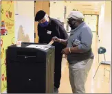  ?? Christian Abraham / Hearst Connecticu­t Media ?? Patricia Hollington votes in the special election for the state House’s 145th District seat.