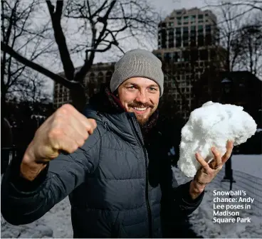  ??  ?? Snowball’s chance: Andy Lee poses in Madison Square Park