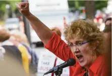  ?? Julie Bennett / Associated Press 2019 ?? Christa Brown of Denver, speaking at a rally in 2019, says she was abused by a Southern Baptist minister as a child.