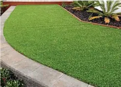  ??  ?? Hmmm .... Can you see the join across the middle of this display home’s fake turf lawn?