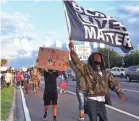 ?? MALCOLM DENEMARK/FLORIDA TODAY ?? Protesters demonstrat­e for justice Nov. 18 after the killing of two teens in Cocoa, Florida, by Brevard County deputies. The deputies were placed on paid administra­tive leave.