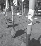  ?? ?? Shovels stand at the ready Wednesday for the official groundbrea­king of I Promise Housing in Akron.