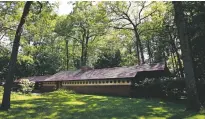  ?? CHARLES KRUPA/THE ASSOCIATED PRESS ?? The Zimmerman House, designed by Frank Lloyd Wright in Manchester, N.H., was built in 1950. The home is the focus of special tours and talks this summer in honor of the anniversar­y of Wright’s 150th birthday year.