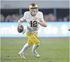  ?? TODAY SPORTS GARY A. VASQUEZ/USA ?? Quarterbac­k Ian Book has thrown 19 TD passes in nine games for Notre Dame this season.