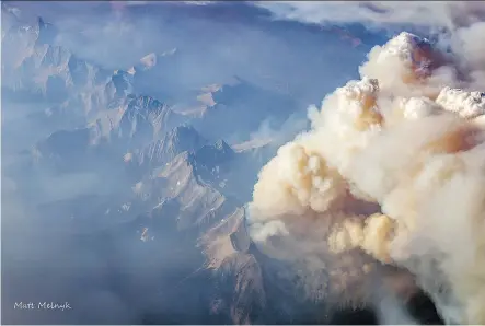  ?? PHOTOS: MATT MELNYK ?? Matt Melnyk was flying from Calgary to Vancouver Wednesday when he took these photos of the B.C. wildfires from 40,000 feet.